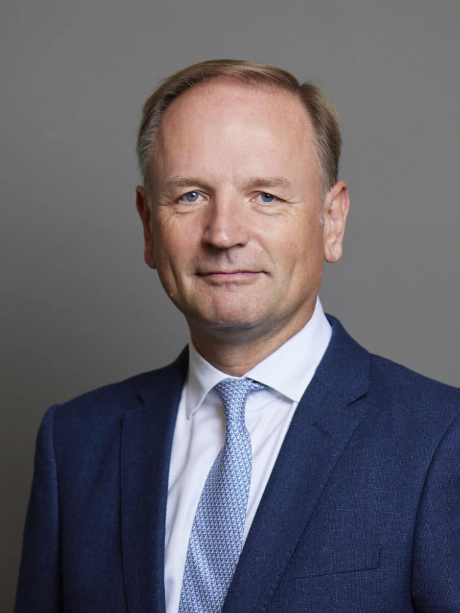 simon stevens in blue suit, pale blue tie and white shirt
