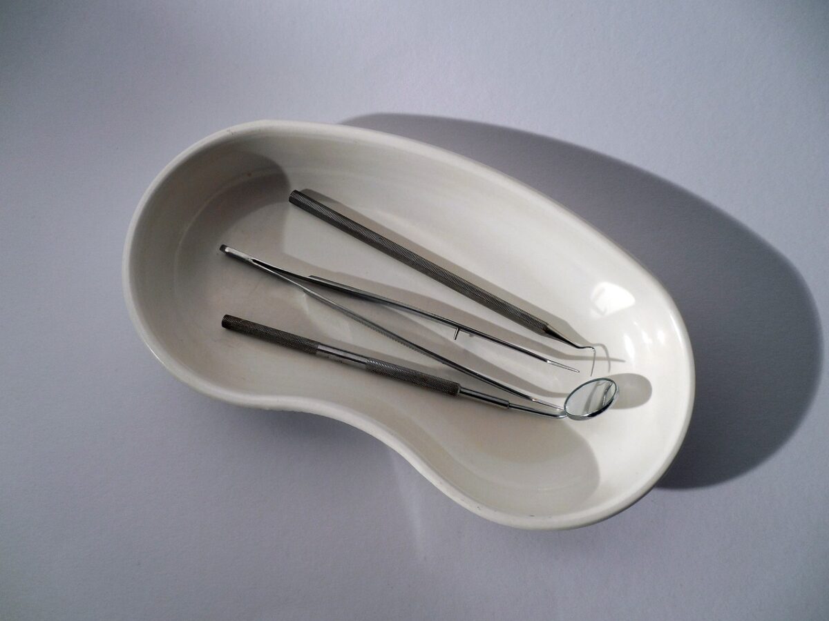 medical bowl containing metal dentistry tools