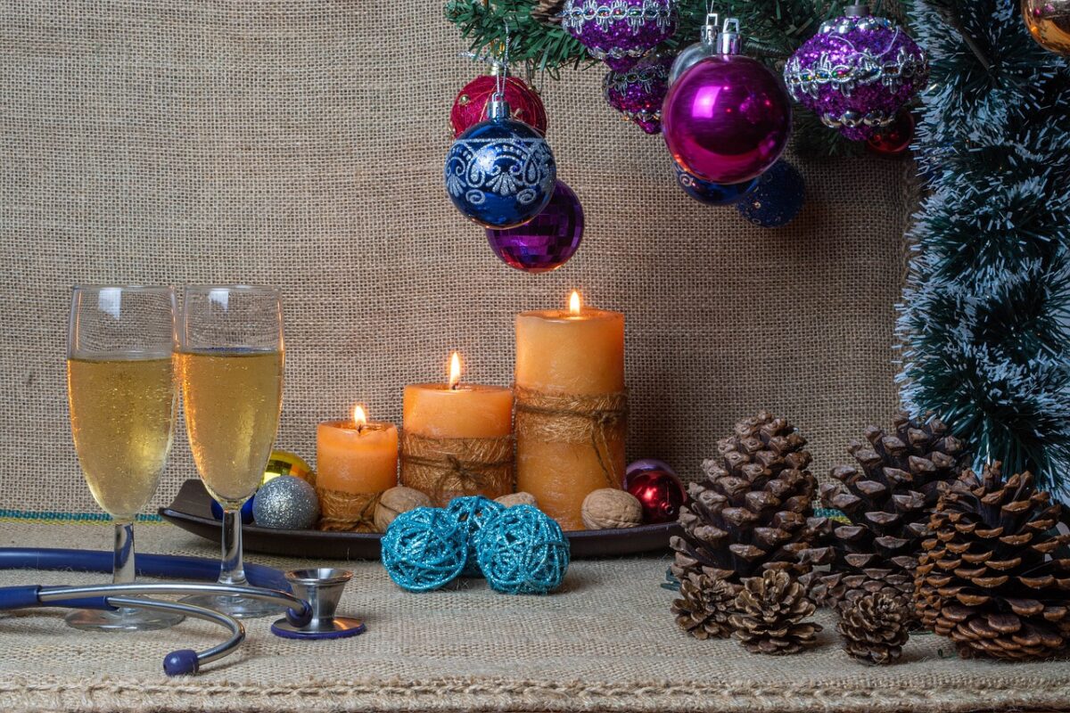stethascope on a table surrounded by christmas decorations