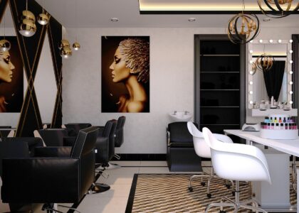 contemporary beauty salon with black leather barber chairs and white treatment chairs with art work on the walls